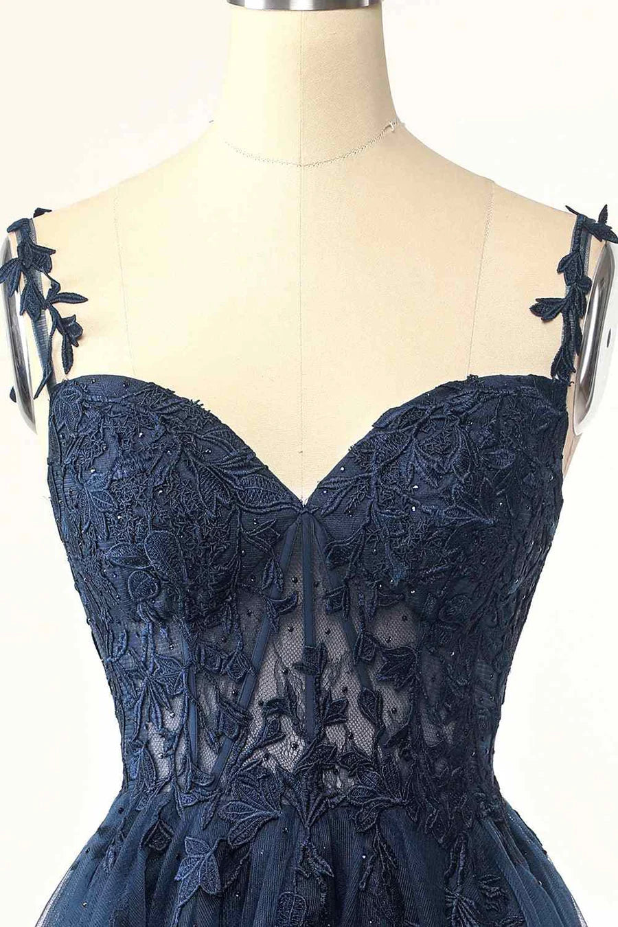 Side profile of the model in the elegant A-line homecoming dress.