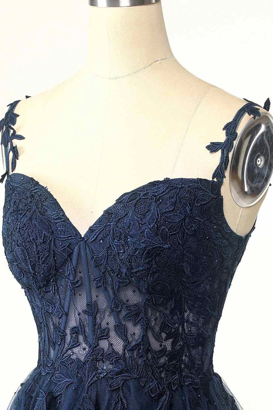 Detail of the flower straps and bodice of the homecoming dress.