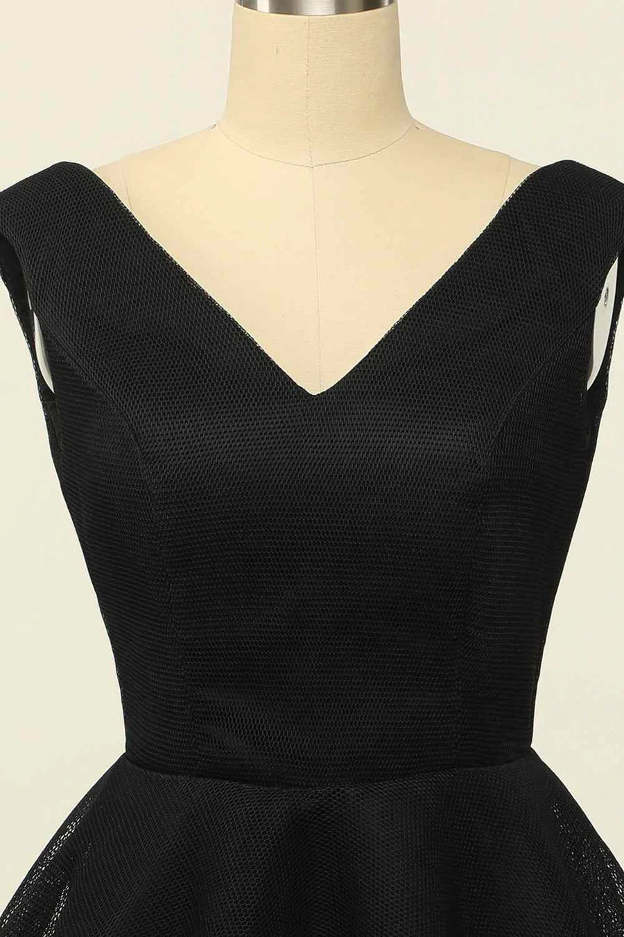 Close-up of the tulle fabric and V-neckline on the homecoming dress.