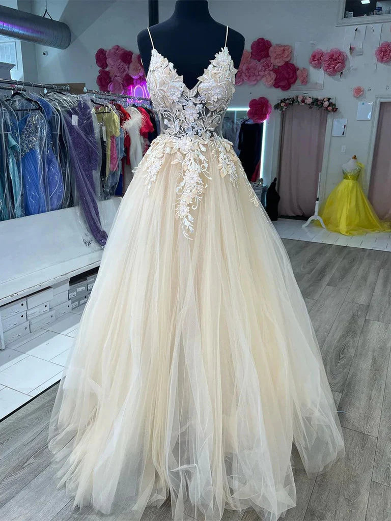 Elegant A-line V-neck prom dress with tulle and lace details.