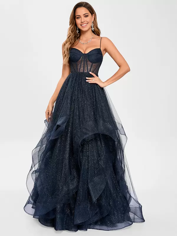 Woman wearing an elegant A-line V-neck tulle formal dress.