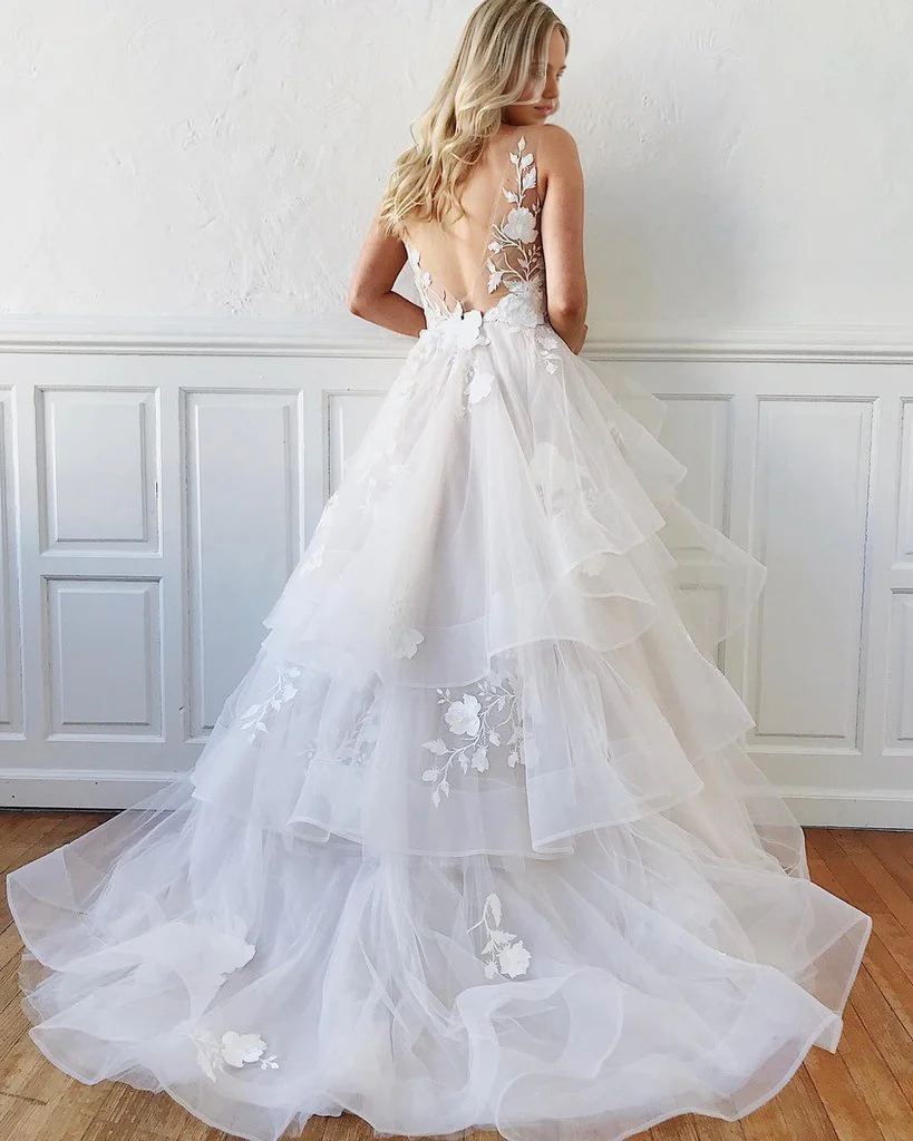 Back view of the A-line V-neck white lace floral evening gown.