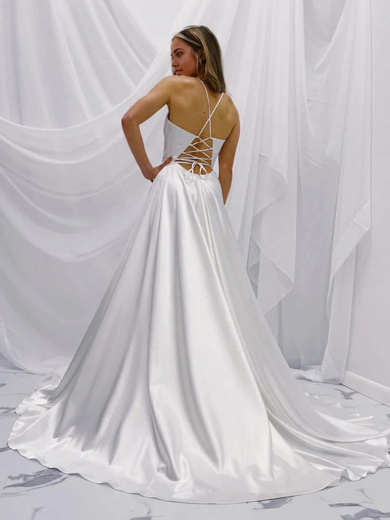 Back view of the A-line V-neck white satin long dress, showing the backless design.
