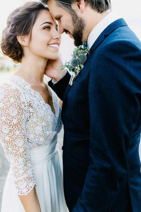 Side profile of the A-line wedding dress, highlighting lace details and flowing chiffon skirt.