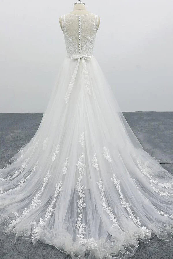 Elegant A-line wedding dress with V-neck and tulle skirt.