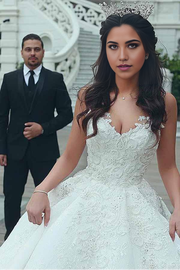 Close-up of lace appliques on the A-line V-neck wedding dress.