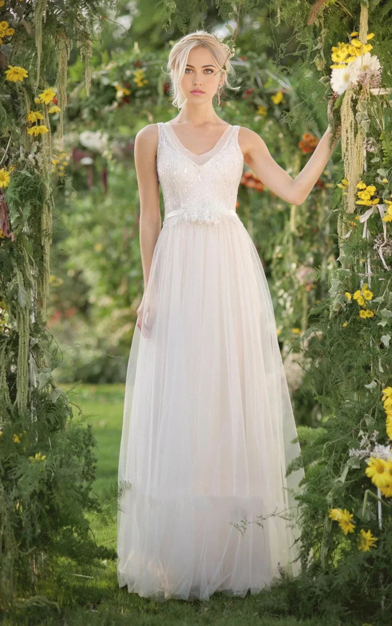 Full-length view of an A-line V-neck wedding dress with beading and sequins.