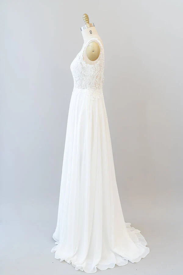 Side view of an A-line V-neck wedding gown with elegant drape.