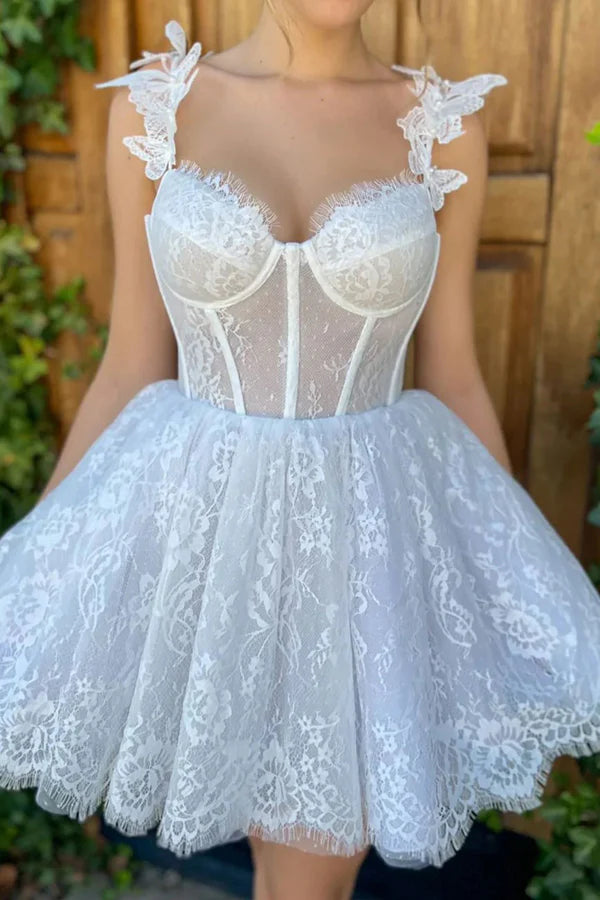 Side view of a white A-line lace short homecoming dress.