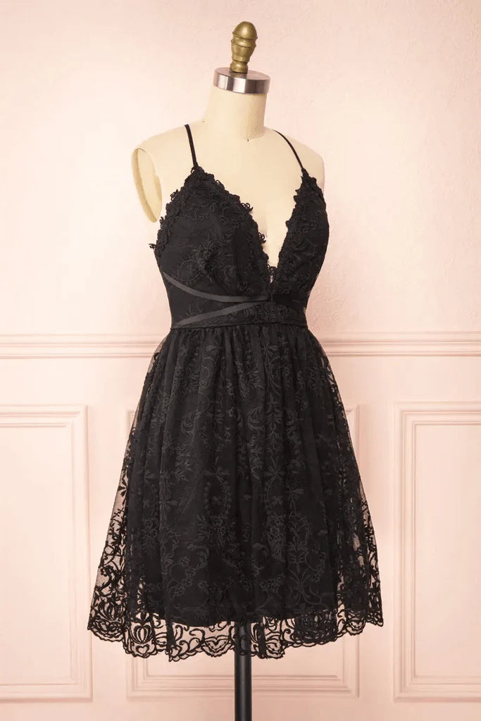 Side view of an elegant black lace homecoming dress.