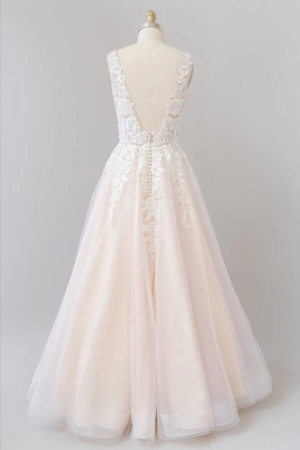 Side view of an A-line V-neck wedding dress with delicate lace details.