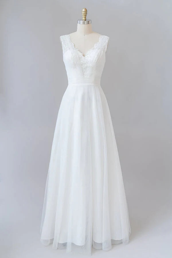 Elegant A-line V-neck lace and tulle wedding dress with a backless design.