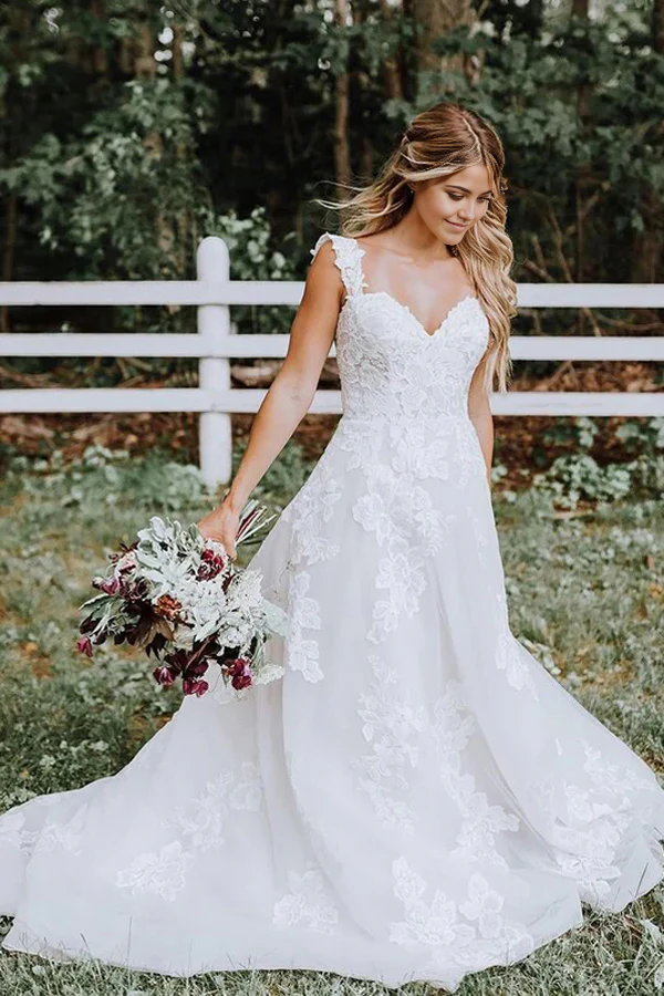 A-line V-neck wedding dress with lace and tulle.