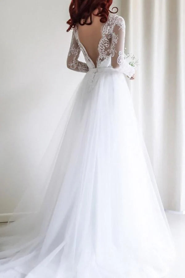 Back view of the A-line white lace bridal gown.
