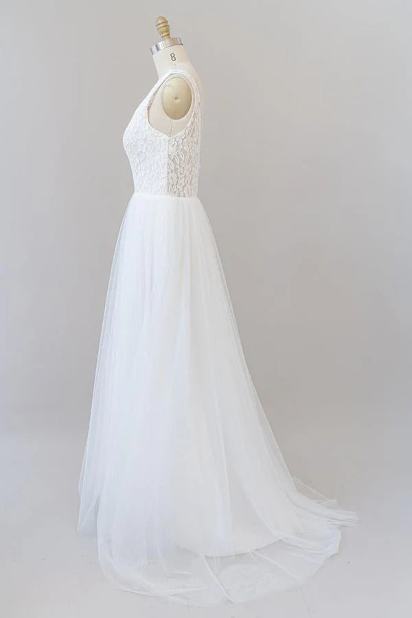 Side view of the long tulle skirt on the A-line wedding dress.