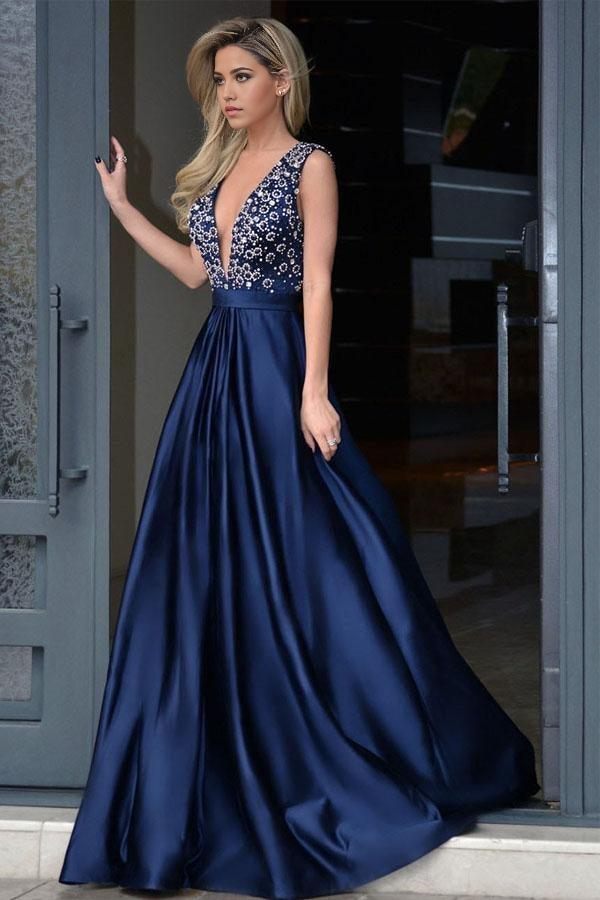 Elegant A-line royal blue satin prom dress with V-neck and beading.