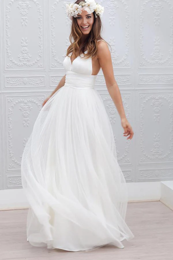 Elegant A-line V-neck wedding gown with a ruched sash, front view.