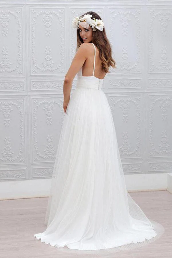 Side view of the A-line V-neck wedding dress, showing the flowing skirt.