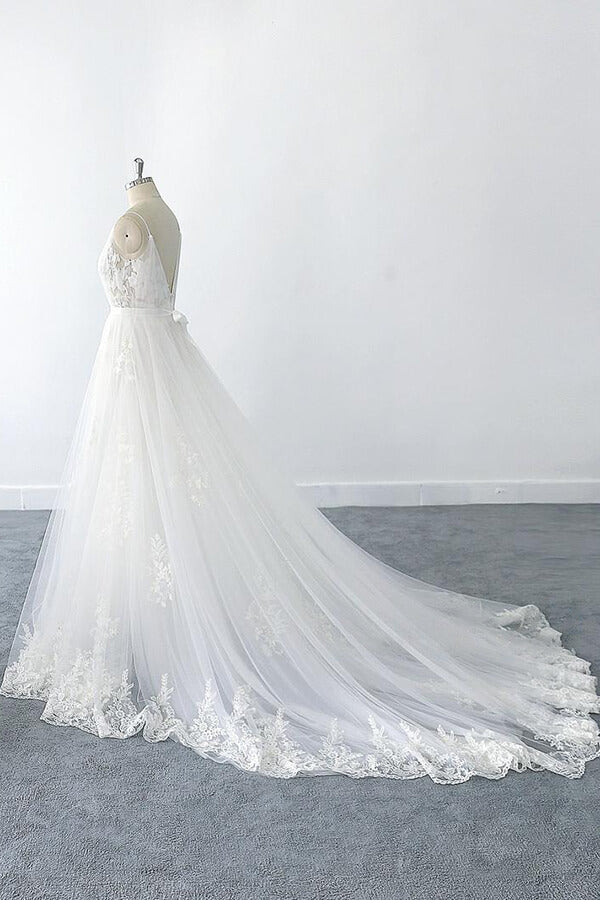 Back view of the long A-line wedding dress, showcasing the flowing tulle skirt.