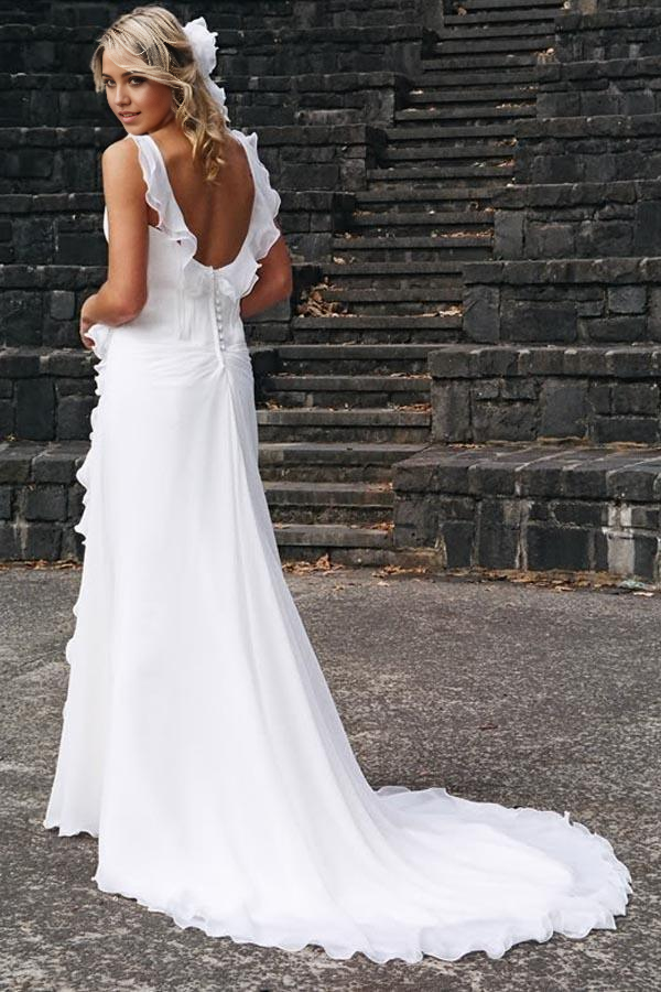 Sleeveless bridal gown with delicate ruffle details.