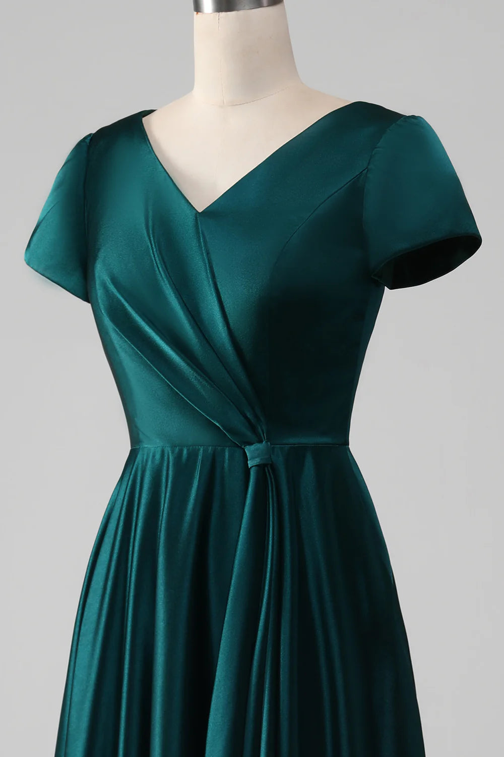 Full length view of the A-line satin gown.