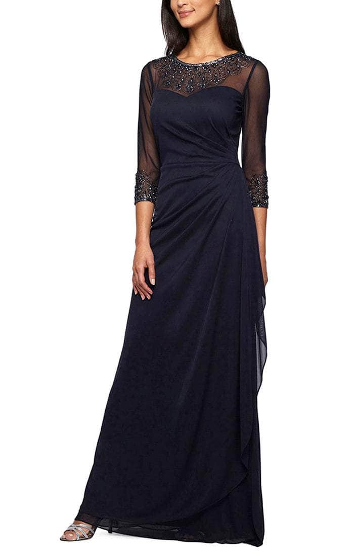 Close-up of the V-neckline and beaded embellishments on a formal gown.