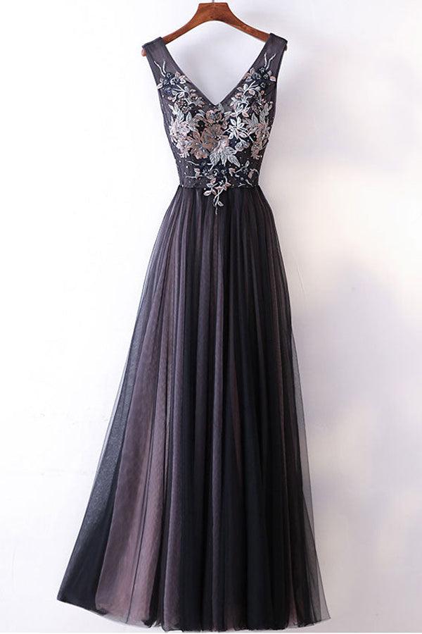Front view of an elegant A-line V-neck spaghetti strap prom dress.
