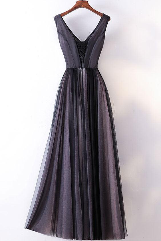 Back view of an A-line V-neck spaghetti strap formal gown.