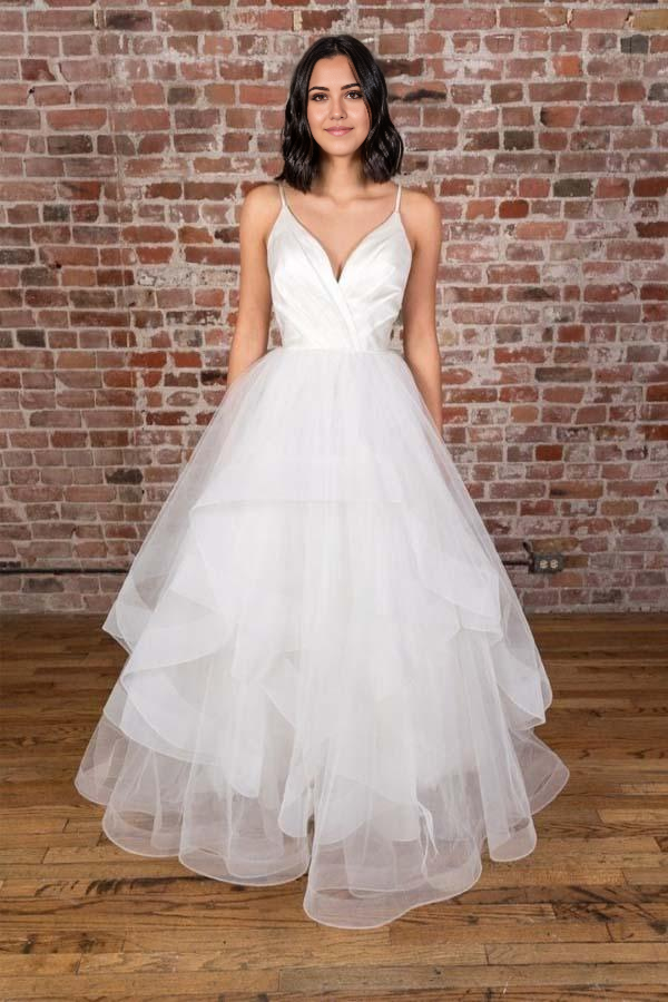 Elegant A-line V-neck white satin wedding dress with delicate straps.