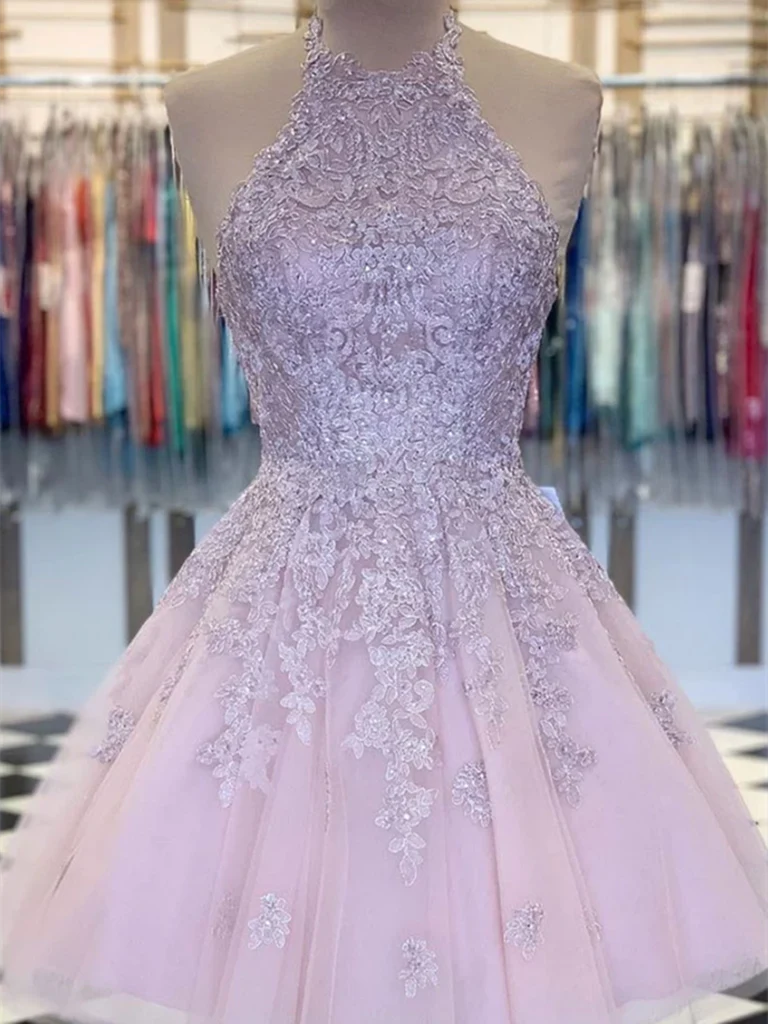 Short A-line dress with V-neck, lace bodice, and tulle skirt.