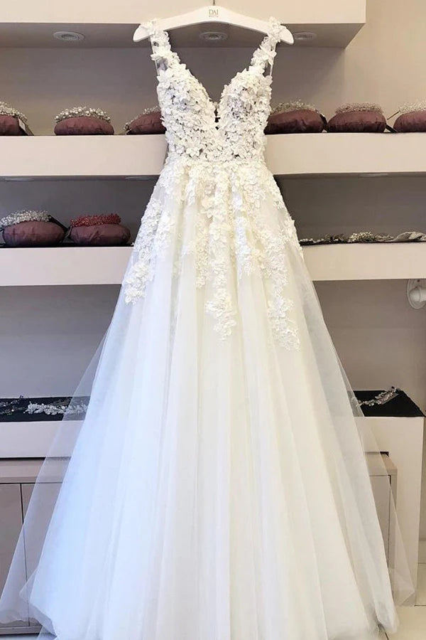Elegant A-line V-neck long wedding dress with delicate appliques.