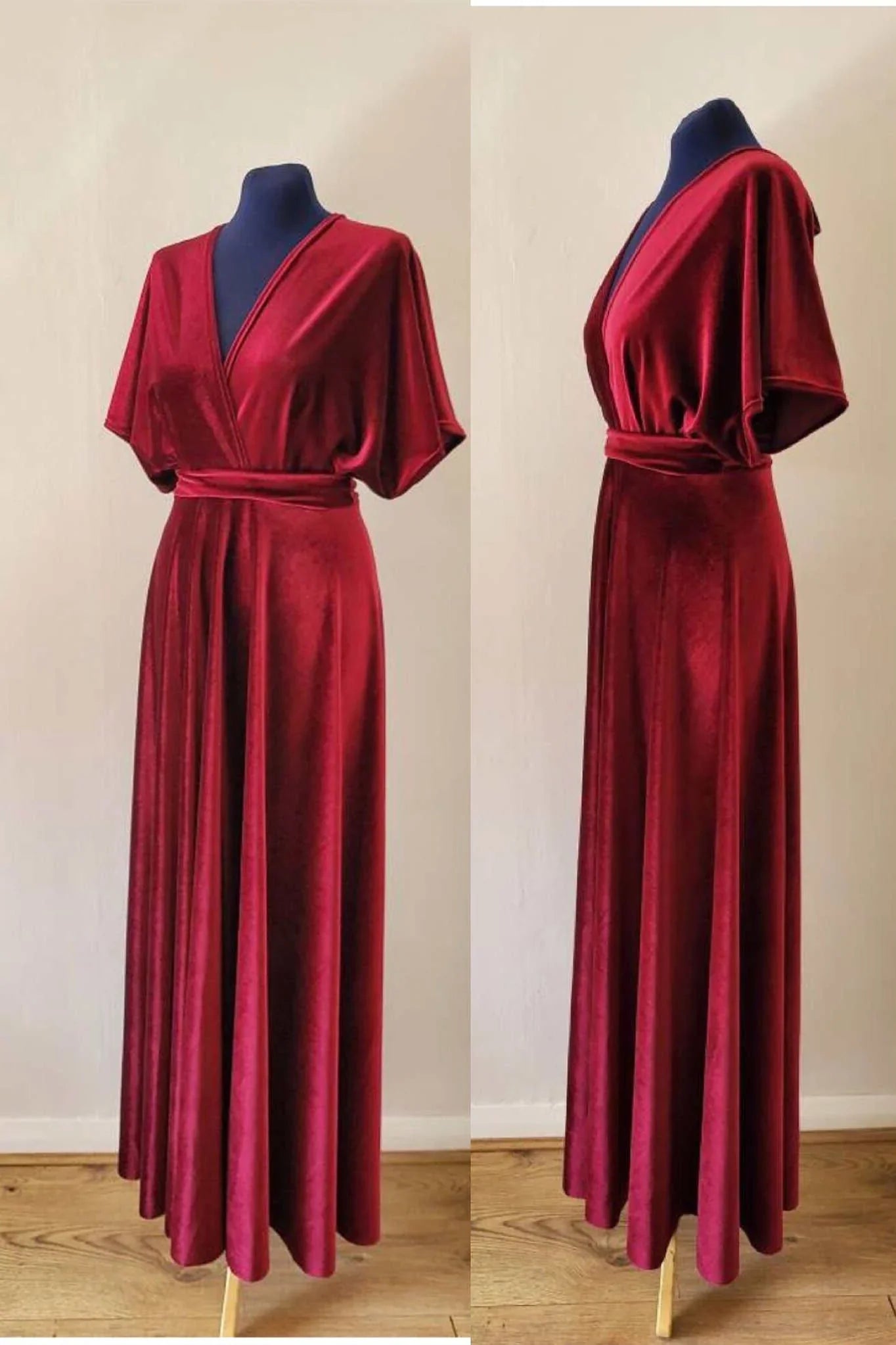 Woman wearing a long burgundy velvet bridesmaid dress.