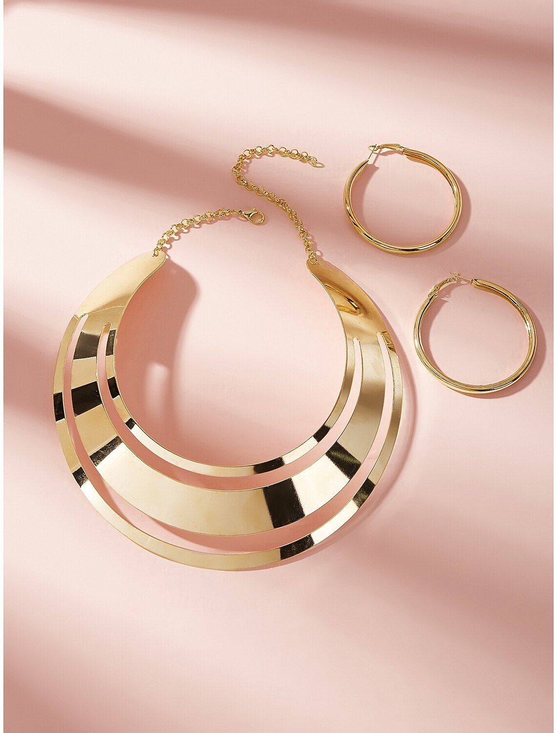 Detailed view of the alloy earrings from the formal jewelry set.