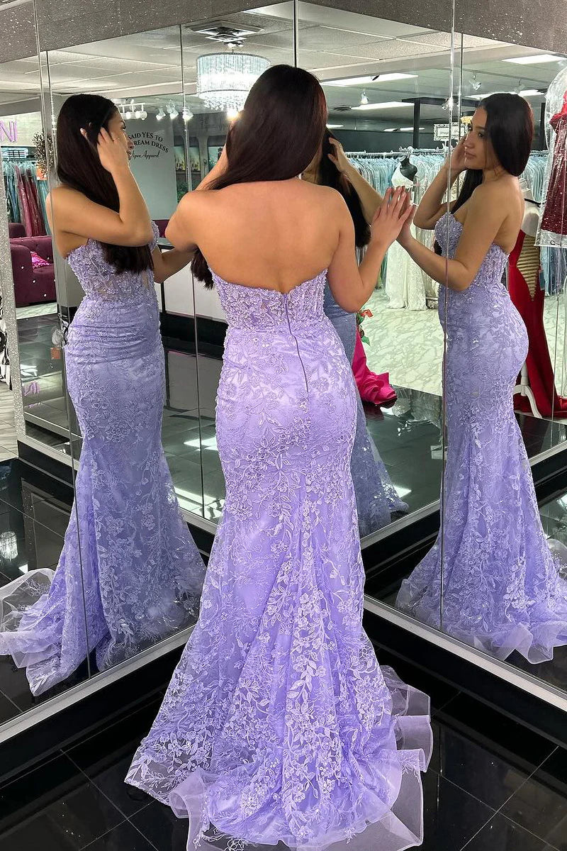 Full length view of light purple mermaid formal dress with delicate appliques.