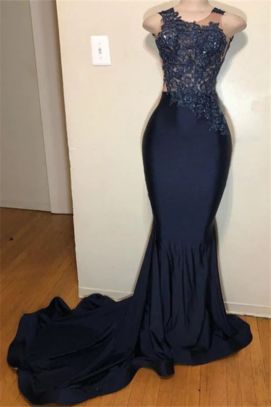 Elegant mermaid prom dress with intricate appliques and a sweetheart neckline.