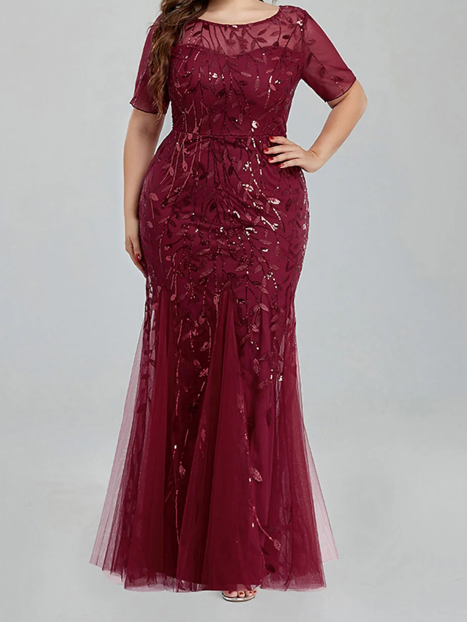 Elegant mermaid mother of the bride dress with applique details.