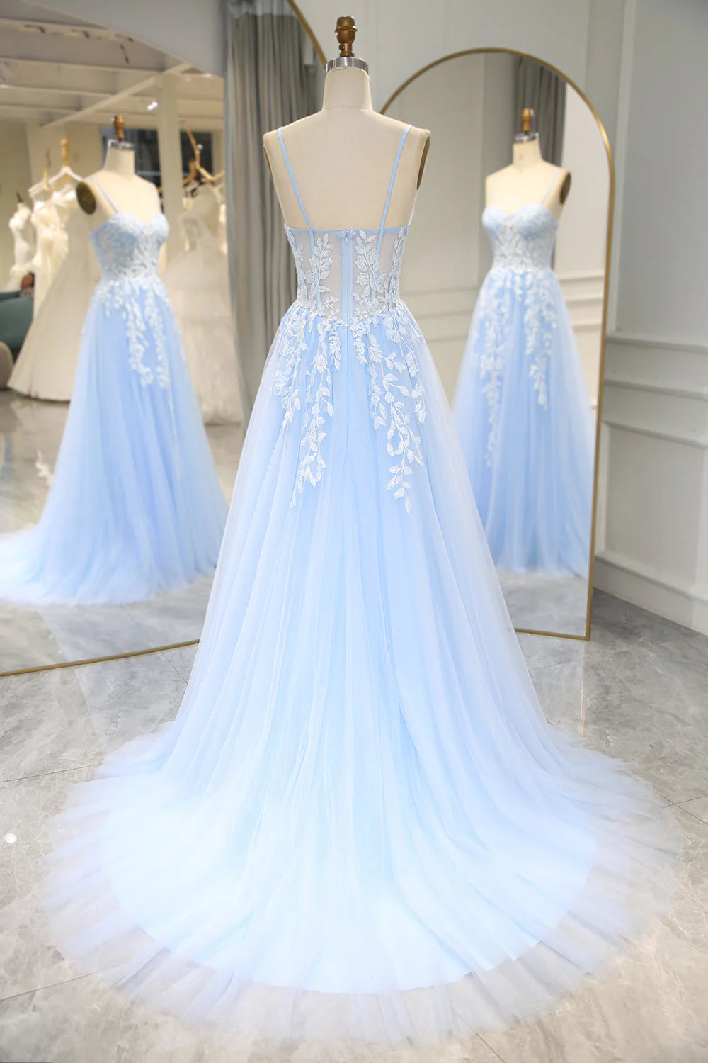 Back view of the appliqued corset halter prom dress, showcasing the intricate details.