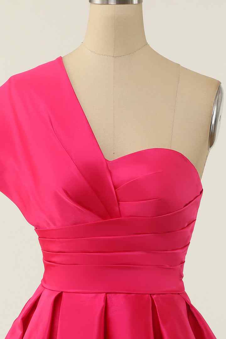 Close-up of the asymmetrical pleating and V-neckline on the homecoming dress.