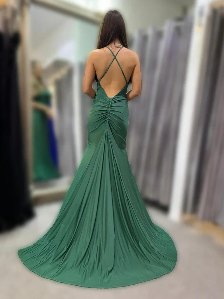 Back view of a long satin mermaid evening dress with open back.