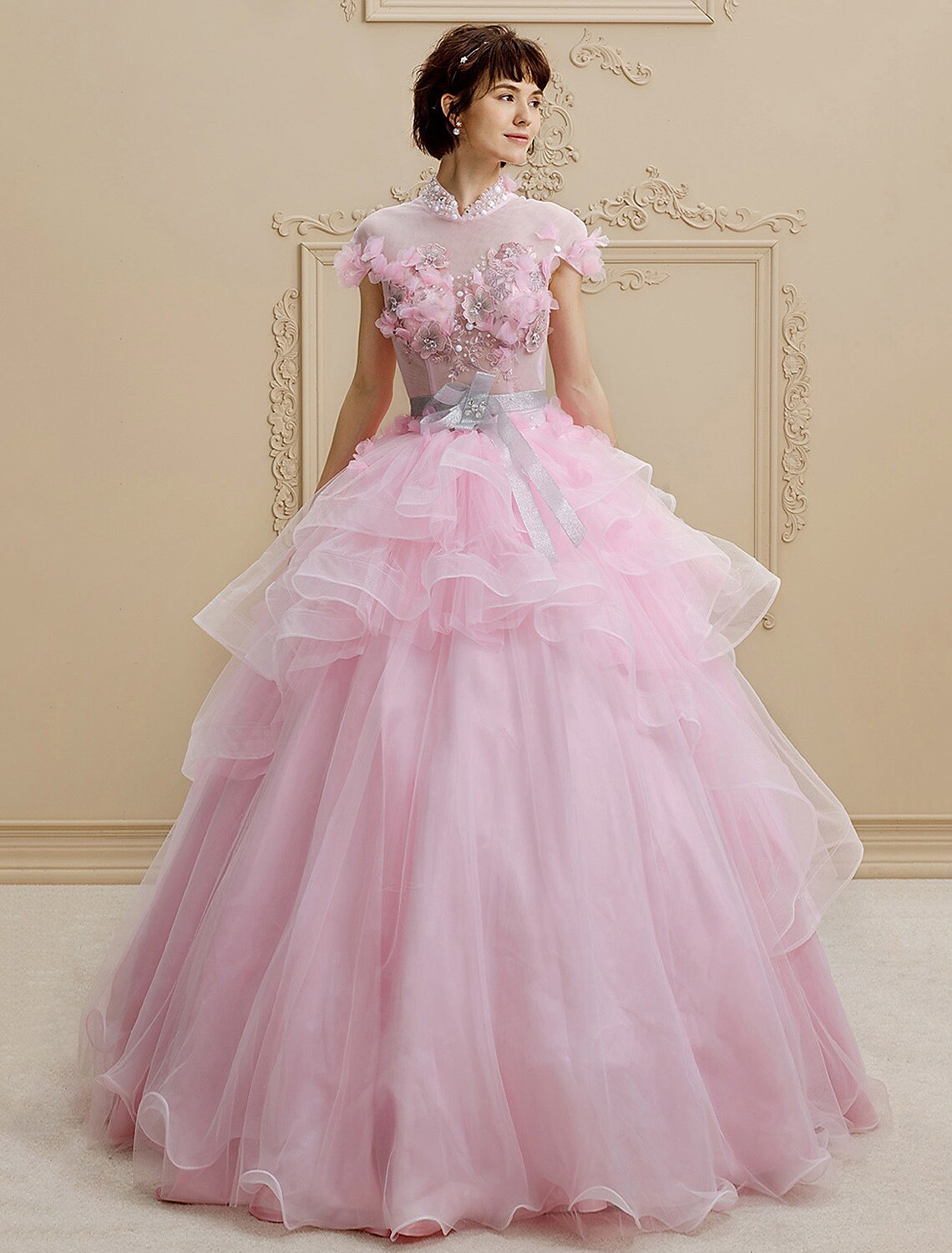 Elegant ball gown wedding dress with high neck and crystal beading.