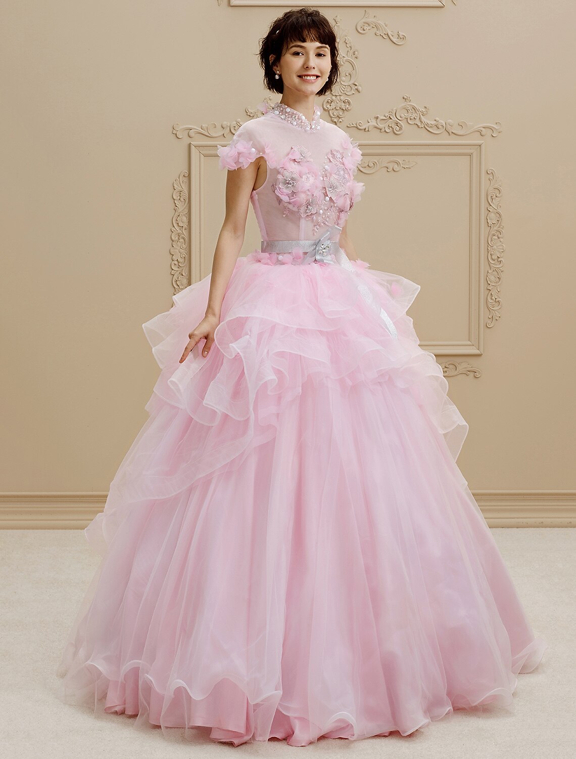 Detail of the high neckline and bodice of the wedding dress.