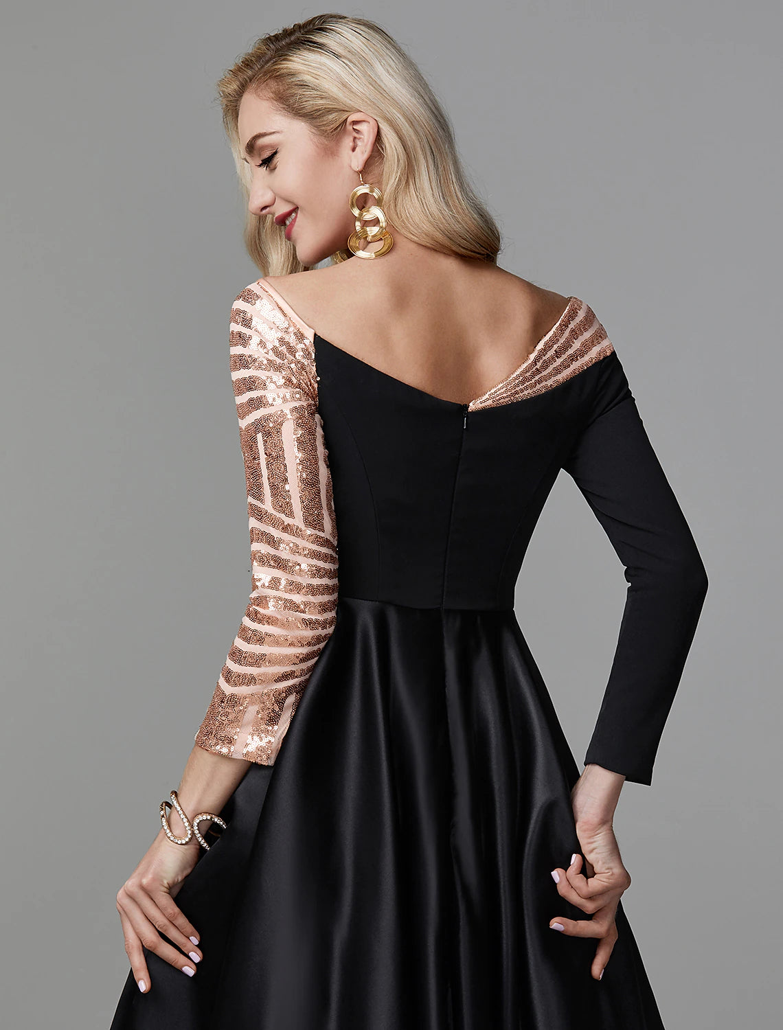 Back view of the sequin embellished satin ball gown.