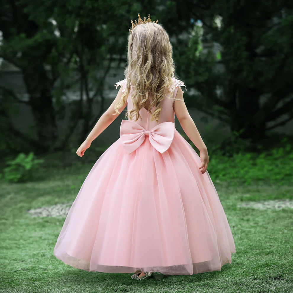 Close-up of the applique details on the flower girl's ball gown.