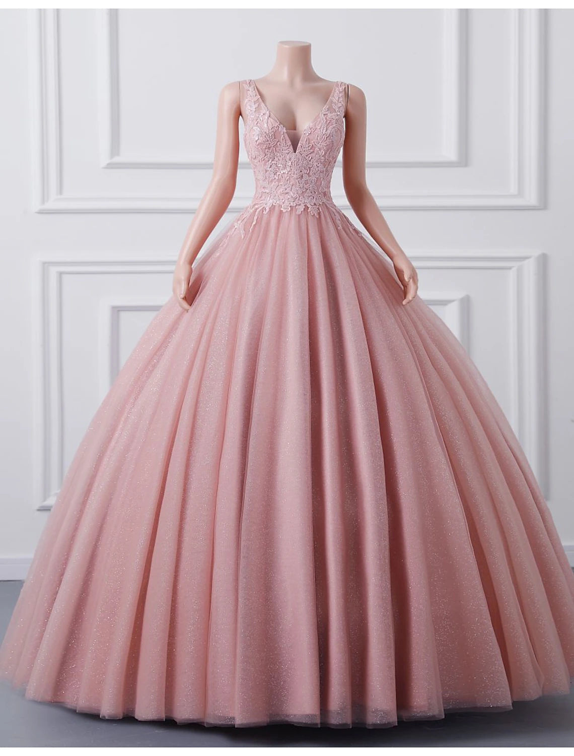 Elegant ball gown Quinceanera dress with sweetheart neckline and sequin appliques.