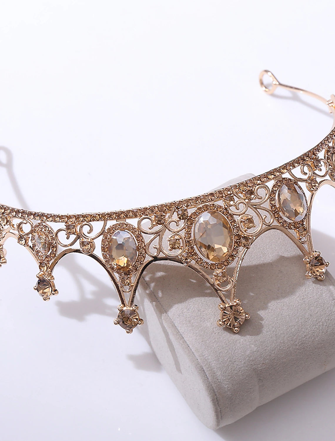 Close-up of the ornate baroque design on a women's crown.