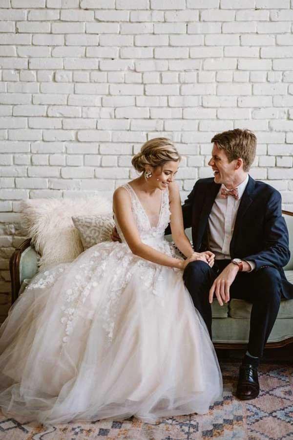 Side view of the ivory A-line wedding dress showcasing its silhouette.
