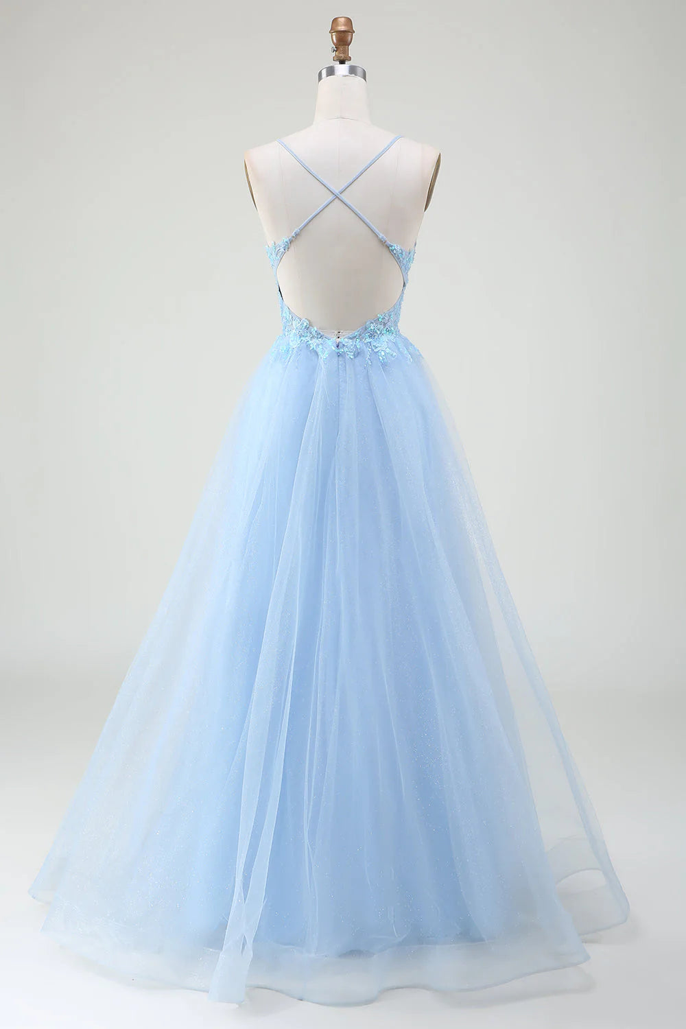 Close-up of the intricate beading on the corset bodice of the light blue prom dress.