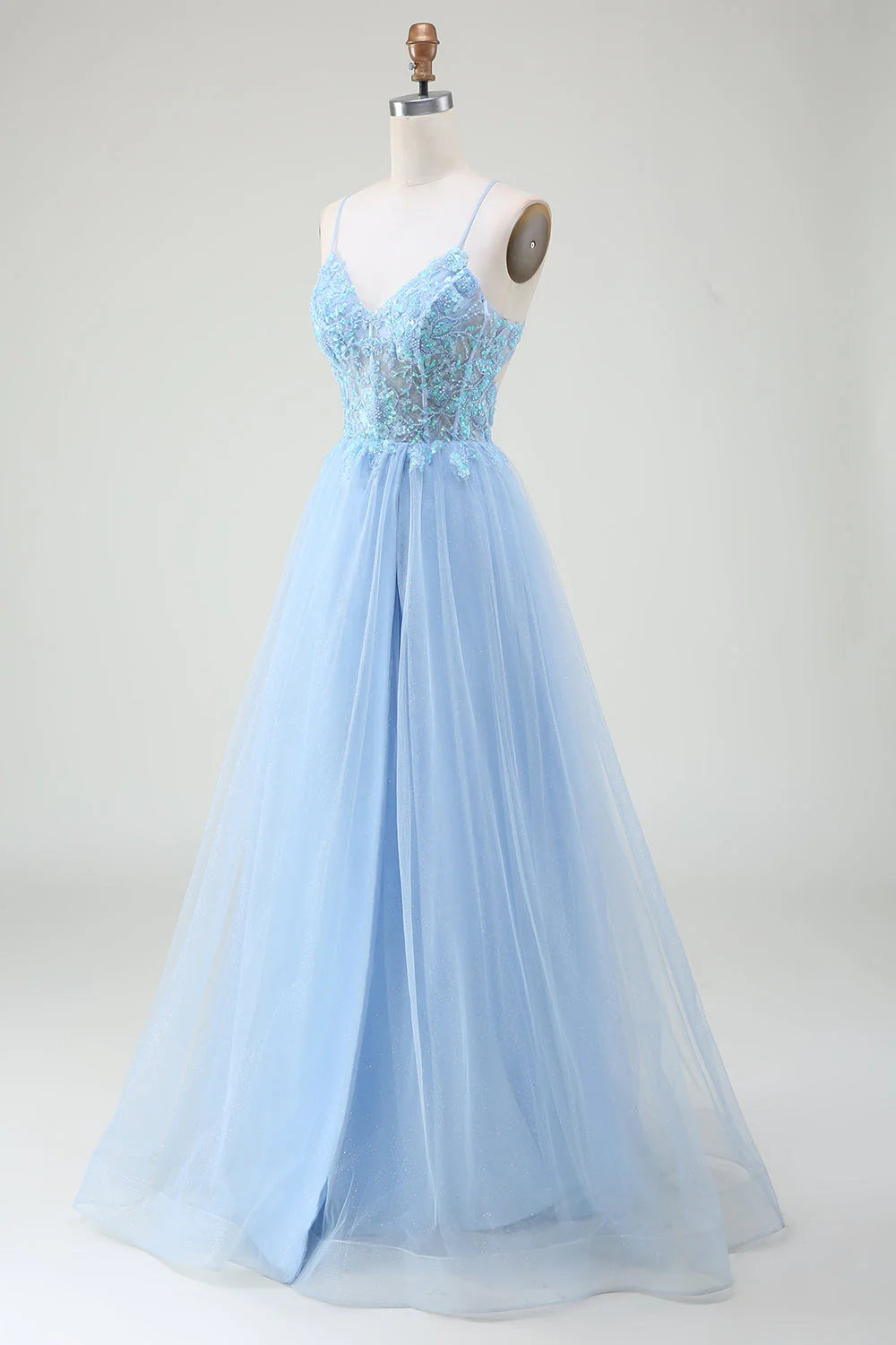 Back view of the light blue A-line prom dress with corset detailing.