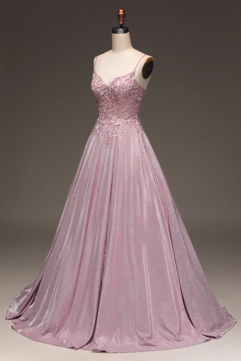 Back view of the blush beaded applique ball gown.