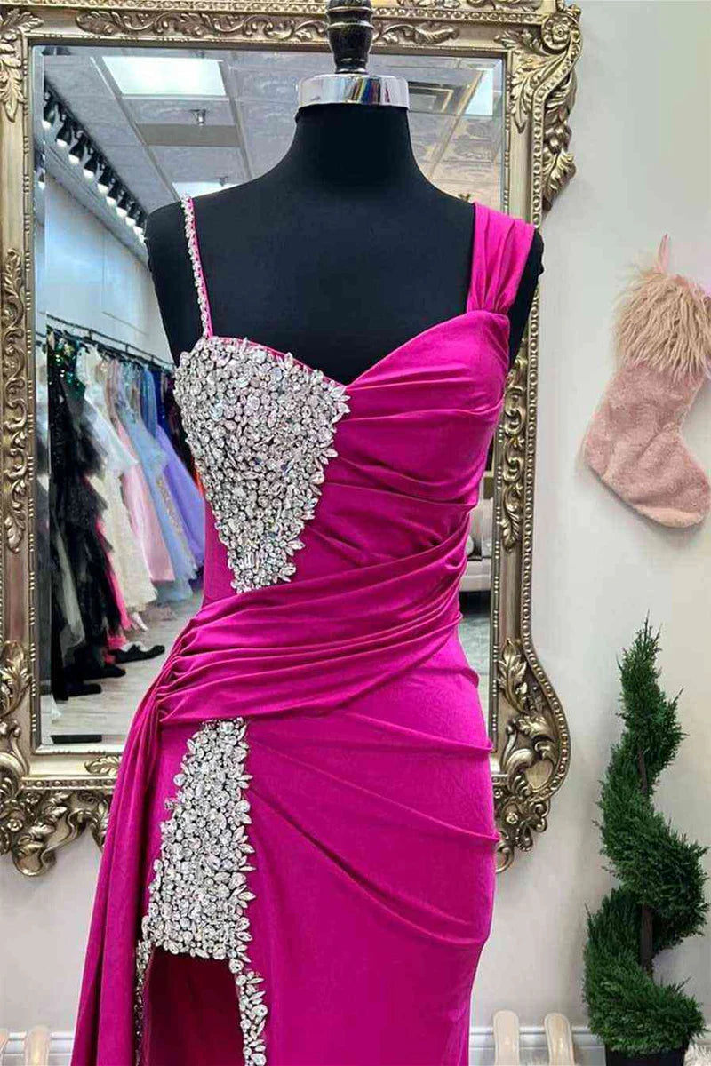 Back view of a woman wearing the elegant beaded prom dress.